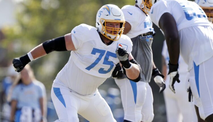 Los Angeles Chargers offensive tackle Bryan Bulaga works on a drill during NFL football practice in Costa Mesa, Calif., Thursday, Aug. 12, 2021. (AP Photo/Alex Gallardo)