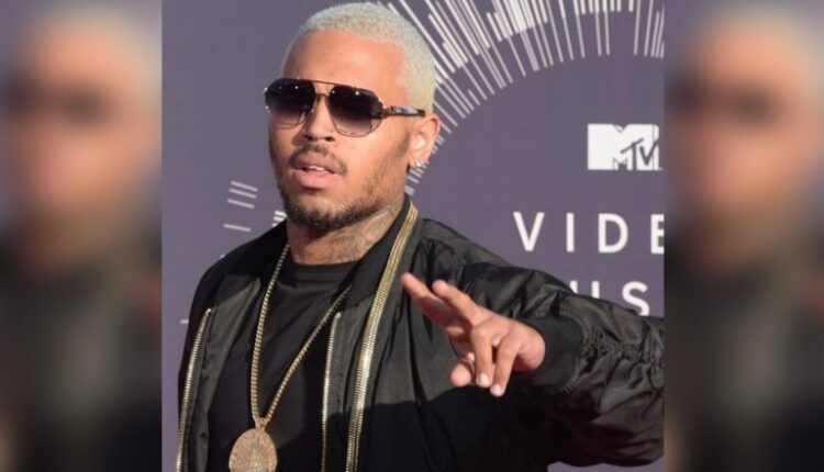 Chris Brown's security team files a battery case against a stranger driving to the celebrity home in the San Fernando Valley

