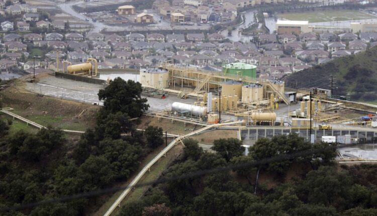 This photo shows a gas gathering plant on a hilltop at the Southern California Gas Company's Aliso Canyon storage facility near the Porter Ranch neighborhood of Los Angeles on Jan. 12, 2017. (AP Photo/Jae C. Hong)