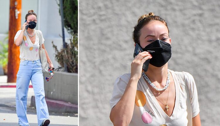 Olivia Wilde struts around Santa Monica in classic Vans slipons

