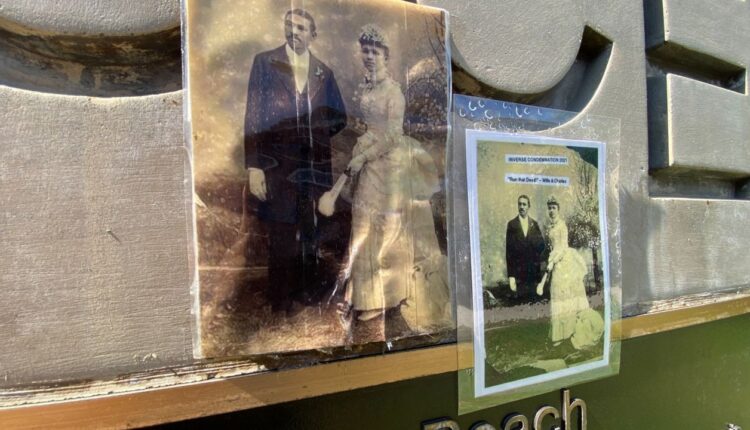 A portrait of Charles and Willa Bruce placed on a monument sign at Bruce’s Beach park (Spectrum News/David Mendez)