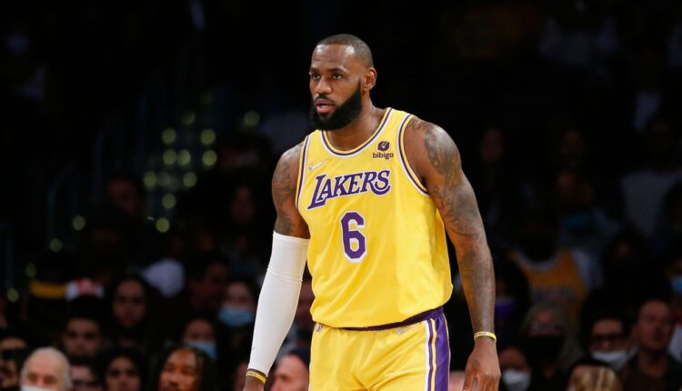 Los Angeles Lakers forward LeBron James (6) walks on the court against the Sacramento Kings during the first half of an NBA basketball game in Los Angeles, Friday, Nov. 26, 2021. (AP Photo/Ringo H.W. Chiu)