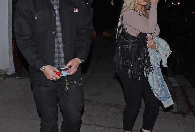 Loved up: Chet Hanks looked smitten as he exited Giorgio Baldi restaurant with a mystery woman in the early hours of Thursday morning in Santa Monica