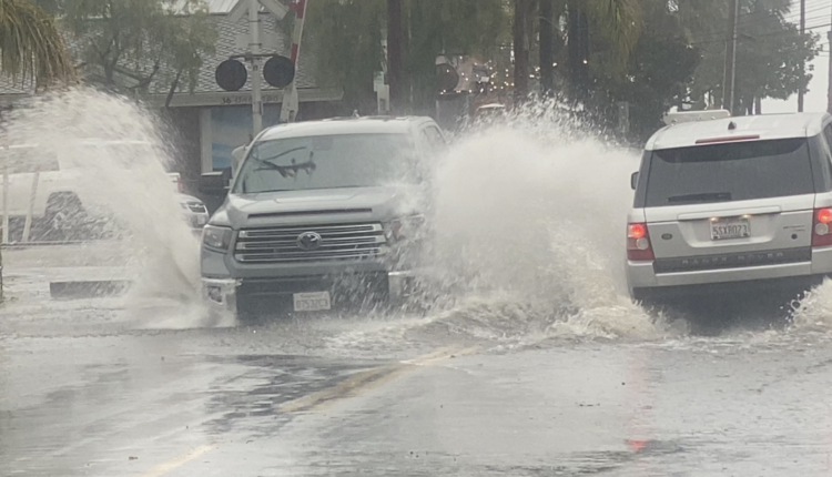 Rain poses a challenge for vacationers and last-minute shoppers on the Central Coast

