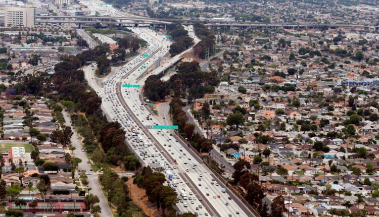 In this May 25, 2017, file photo, Interstate 405, the San Diego Freeway, is seen next to Los Angeles International Airport. (AP Photo/Reed Saxon)