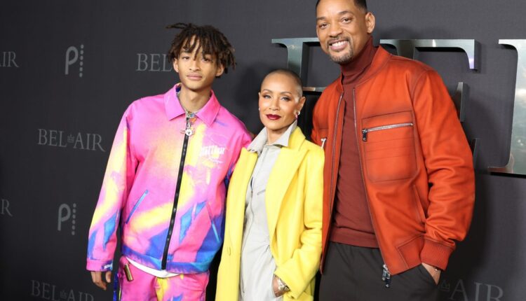 Jaden Smith, who owns a Hidden Hills home, poses on the carpet at the BEL-AIR premiere party with parents Will Smith and Jada Pinkett Smith