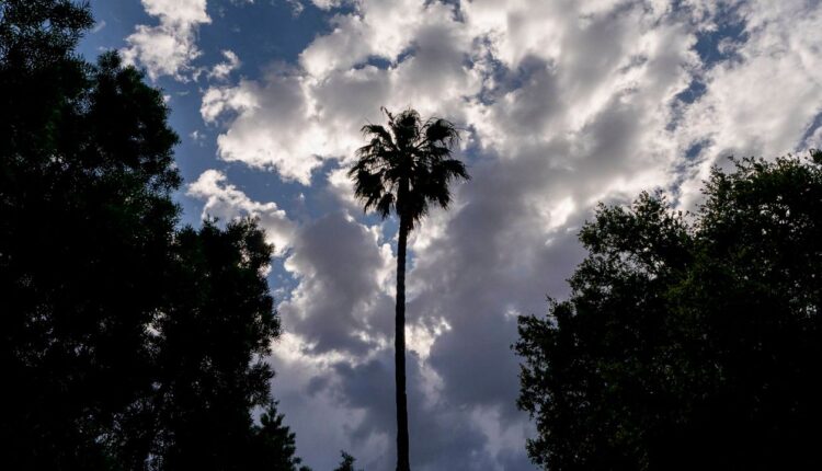Cloud formations move over downtown Los Angeles on Wednesday. (AP Photo/Damian Dovarganes)