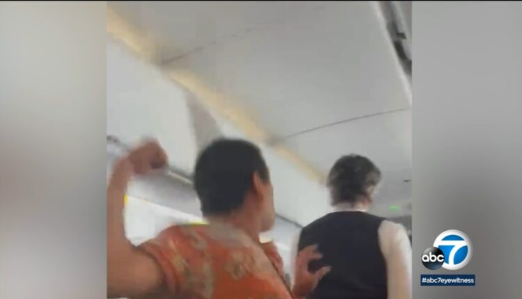 Orange County man federally charged after video shows him punching attendant during LAX-bound flight
